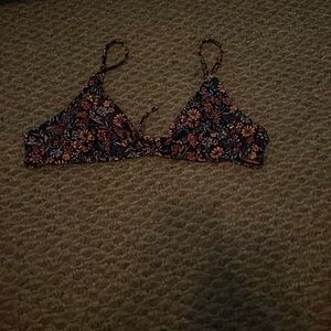 Colorful bikini top with a flower design